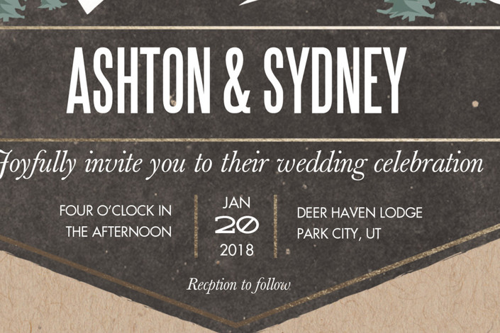 close up rustic mountain wedding invitation
