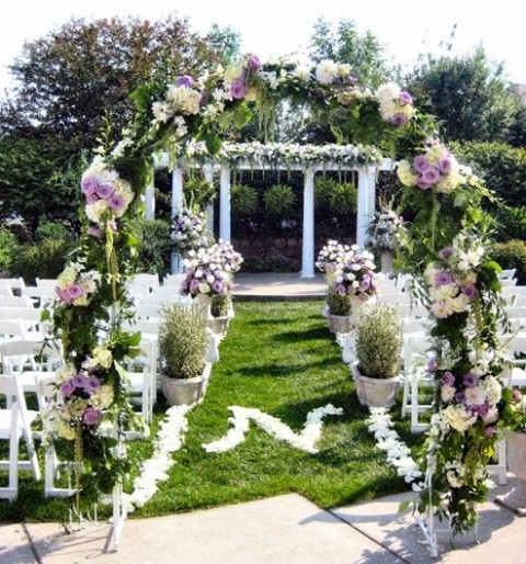 beautiful arch greenery wedding