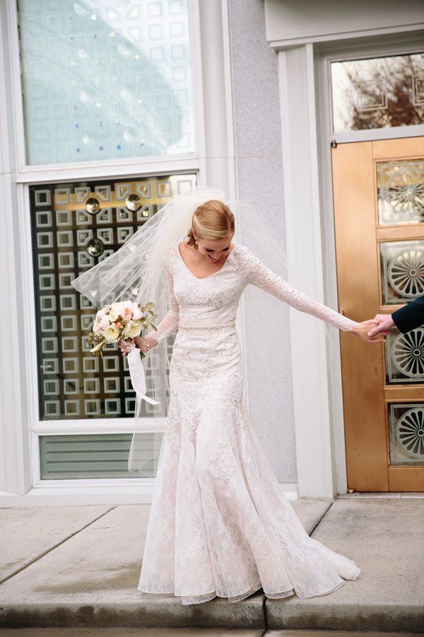 simple white long sleeved gown