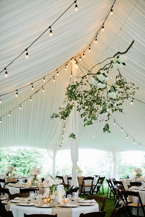 white wedding tent with simple lights