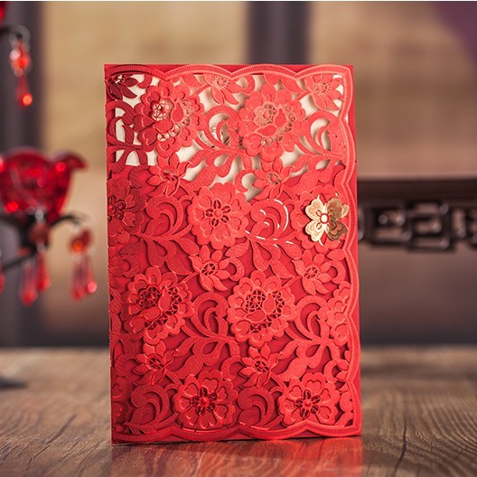 red laser cut wedding invitation