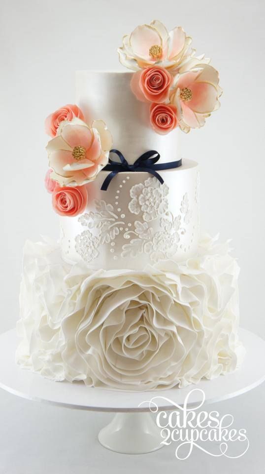 chic elegant wedding cake with flower topping