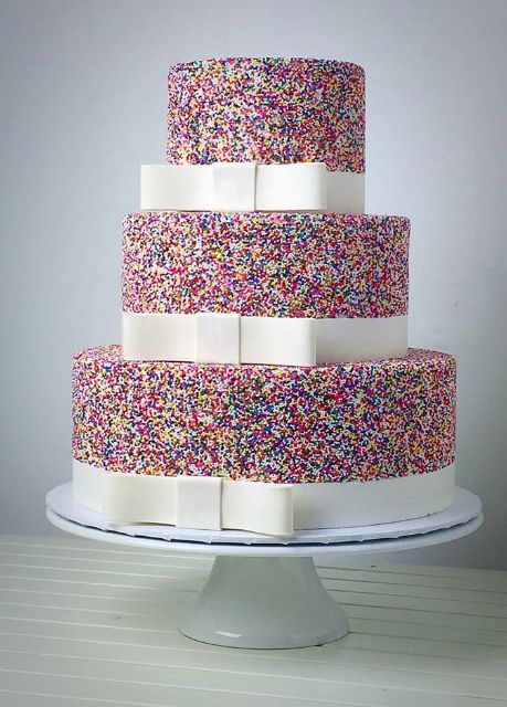 cute and colorful wedding cake with sprinkles