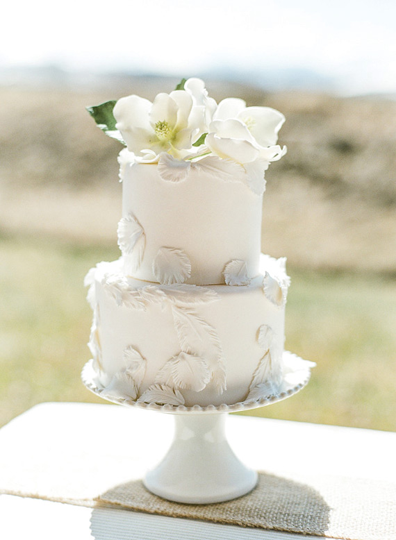 small wedding cake with feather 