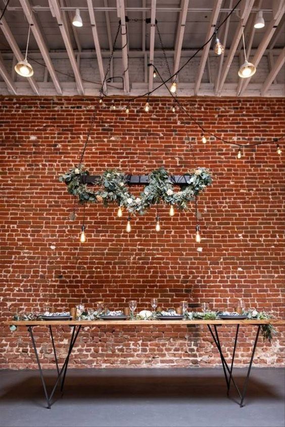 Hanging light bulbs and greenery decoration