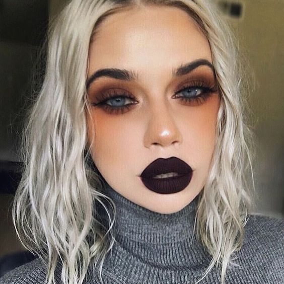 simple Halloween makeup style with black lips statement