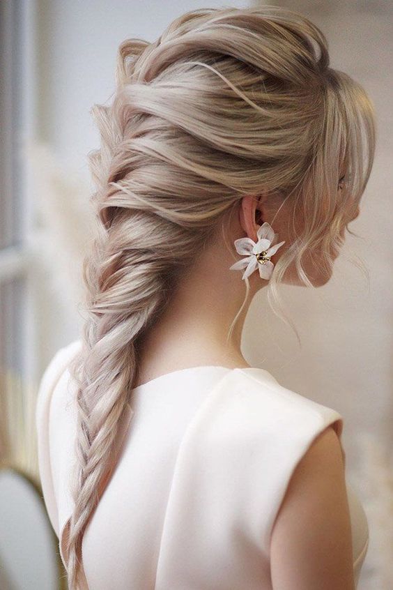 simple braided wedding hairstyle for elegant brides