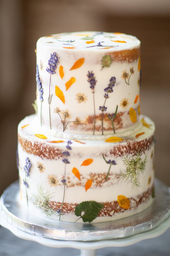 pressed edible flower in wedding cake design