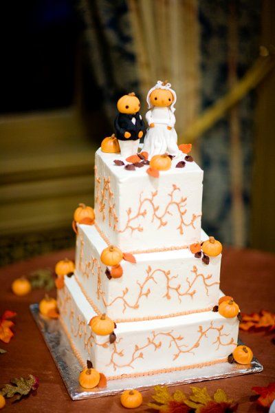 cute pumpkin topper in wedding cake for halloween 