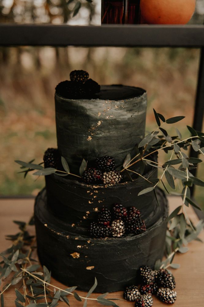 spooky black Halloween wedding cake design