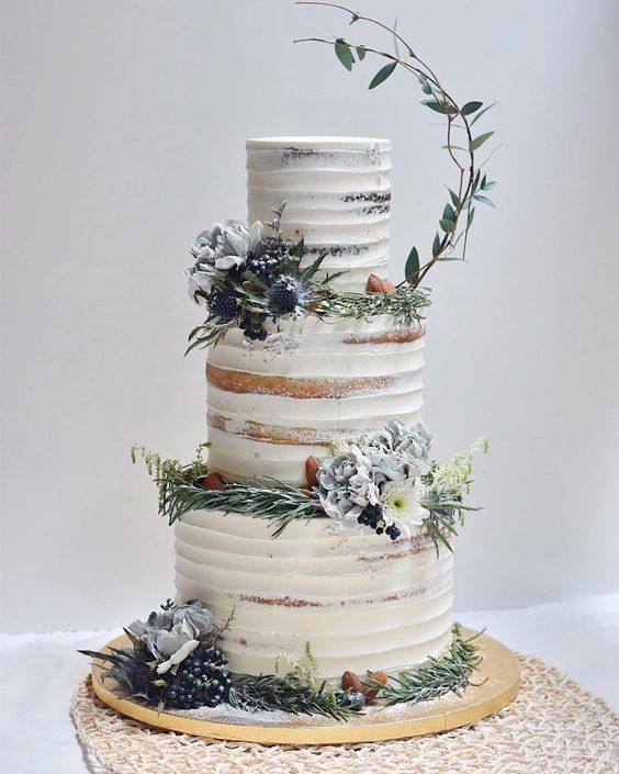 fall wedding cake with dusty blooms